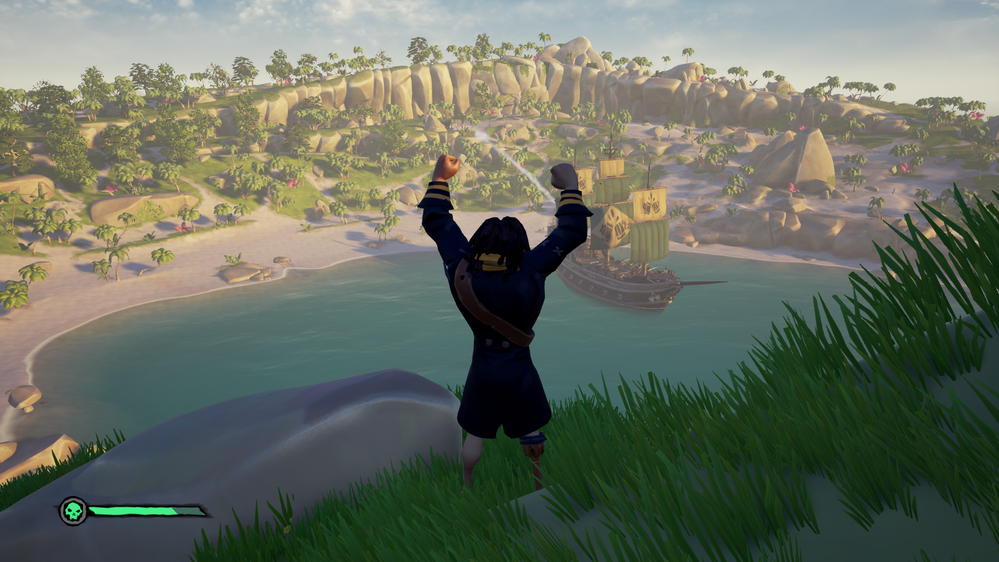 Looking down over the pirate town and your ship from atop a hill