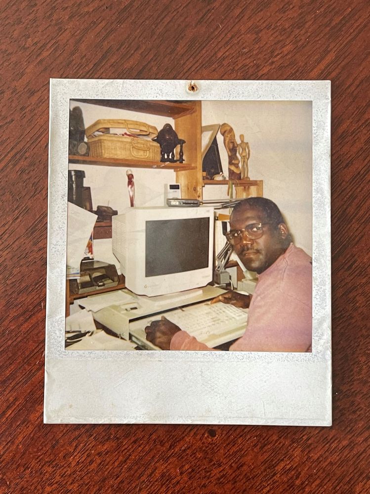 My dad in front of our first computer, a Windows Gateway 2000