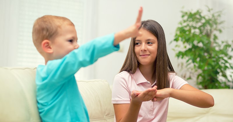 Deaf and Hard of Hearing Children and the Need for Sign Language
