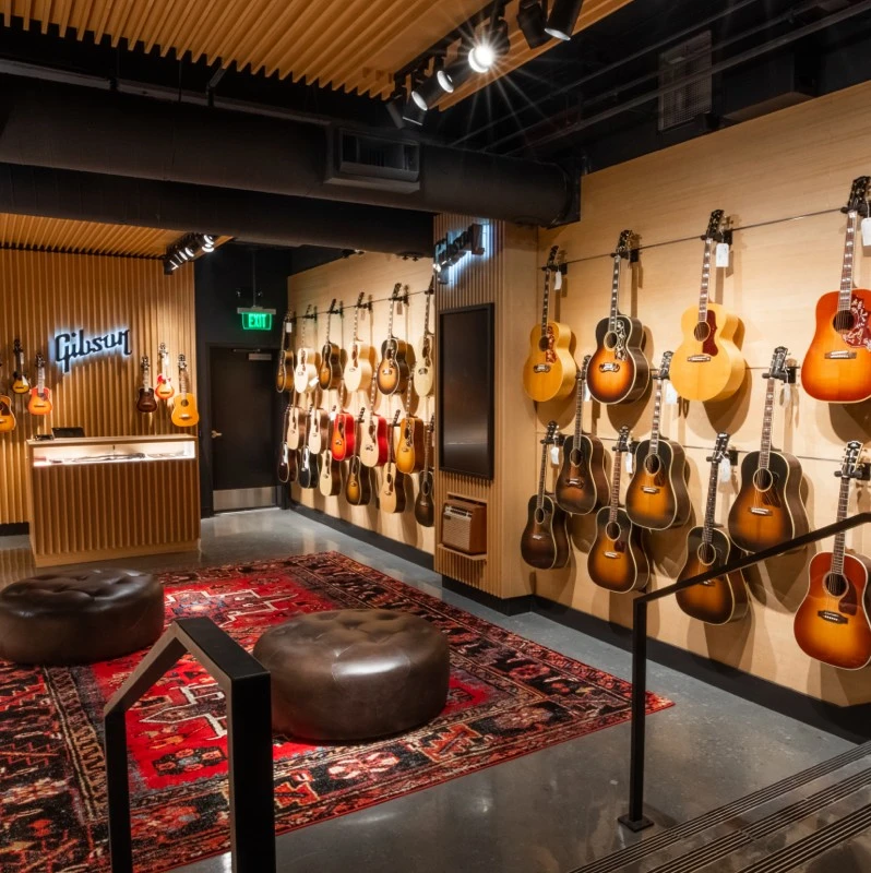 Gibson Guitar store with guitars hanging on the wall